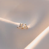 Lily Studs offer a perfect balance of delicate style and subtle sparkle. Crafted from high 18K gold filled and high quality CZs for a timeless look, these mini flower stud earrings will add a finishing touch to any outfit.